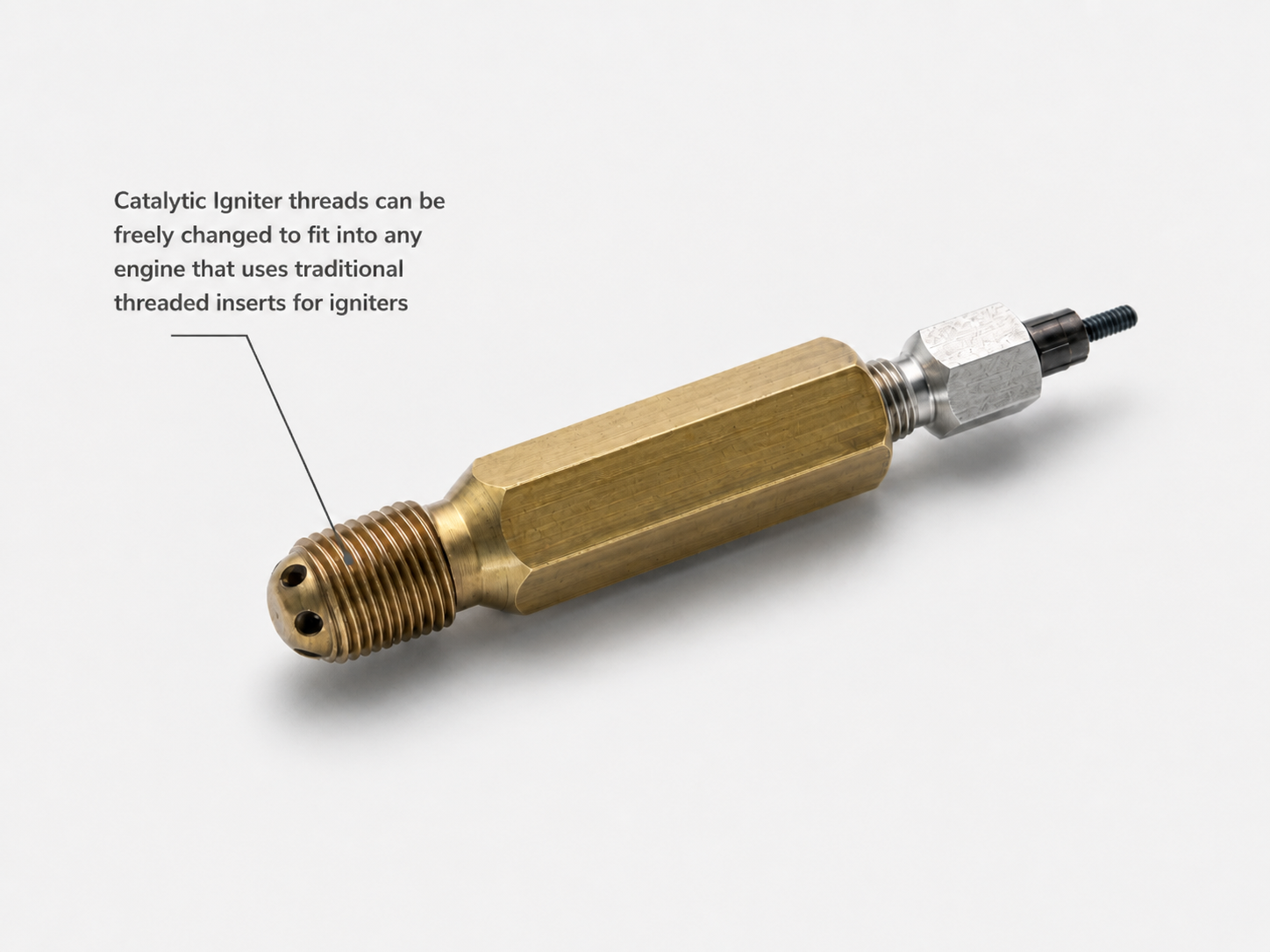 Catalytic igniter integration photograph showing plug-format installation context
